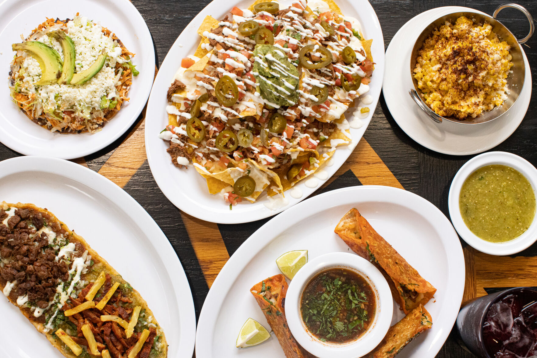 Tostada, nachos, street corn and huarash with biriya